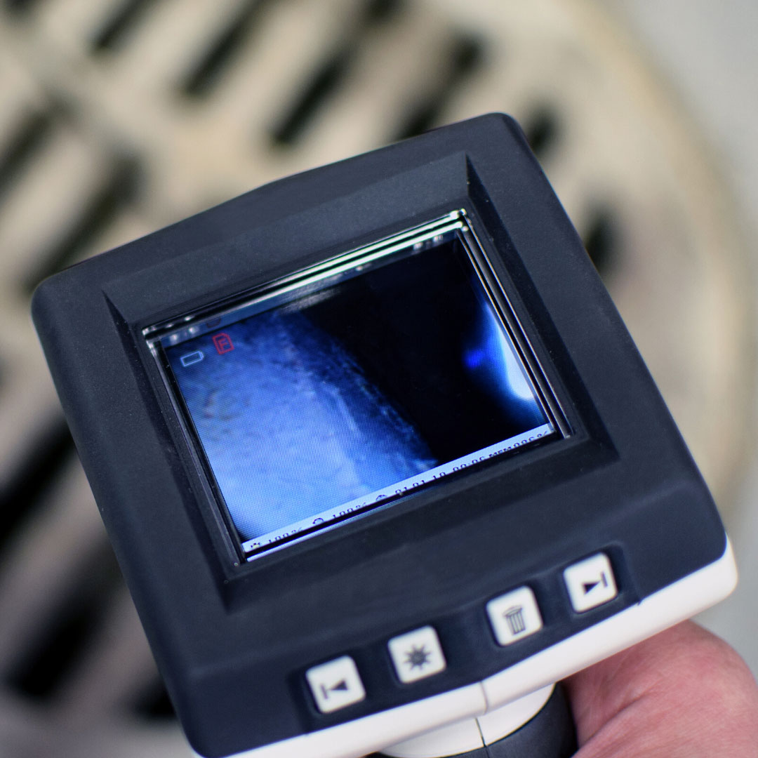 Drain Camera Being Used to inspect Potential Clog in Pipe